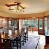View of restored dining room looks south to sunny alcove.  Greenes used mahogany for paneling and trim.  Alcove had been a later addition.  We added posts, benchs and paneling to better integrate it with dining room.  Photo coutesy of John Muir.