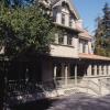 View shows entry to Macky Hall from campus with its new handicap access ramp.