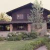 Street view of house with restoration complete.