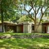 Our addition is south of 1949 house and provides a new entry. A lovely sycamore tree defined limits of expansion and corner of living room.