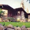 View from sidewalk courtesy of photographer Alexander Vertikoff shows Parsons House in early 1990s.  We built a boulder retaining wall at the lower end of site, and backfilled to reduce the slope. 