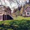 We scaled down the massing of "Carriage House" by adding sheds to both ends and cross gables.   In the heirarchy, we thought garage should appear an accessory to main house.