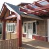 Existing French doors opened to a deck that had been built over garage in an earlier remodel.  We rebuilt pergola, adding clear polycarbonate panels for weather protection.